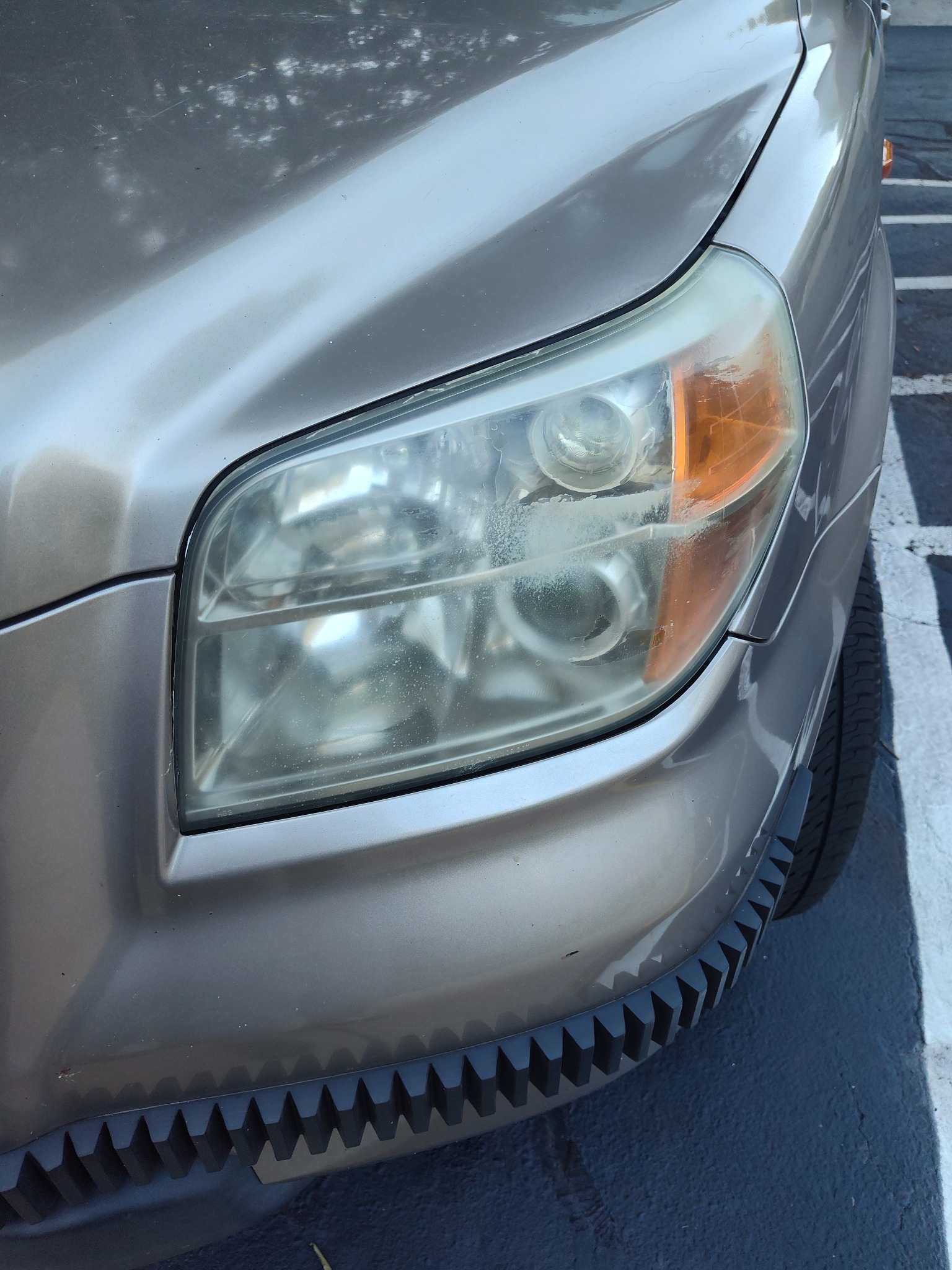 Silver SUV before restoration